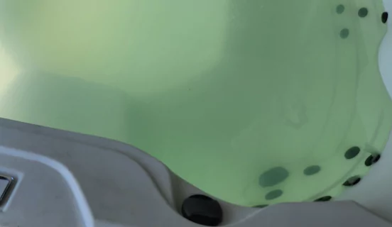 hot bath tub green water